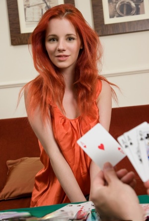 Hot redhead Ariel removes clothes after losing at poker & rolls in the chips