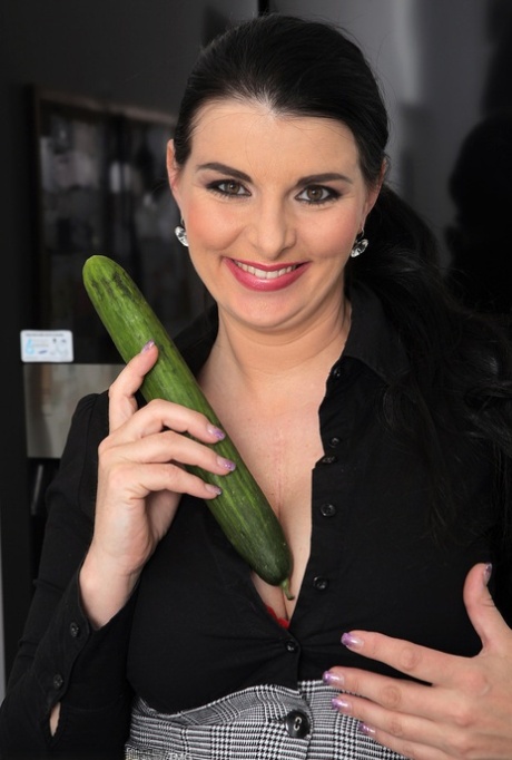 Dark Haired Lady Sandra Nero Pleasures Herself With A Cucumber After Work