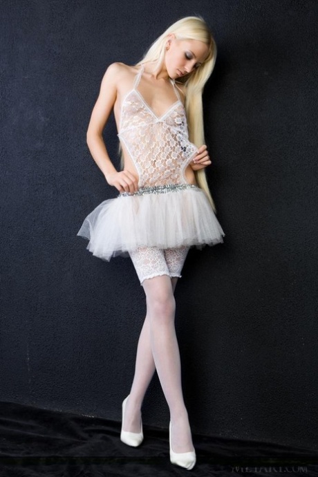 The ballerina dress of slim-looking Alysha A is taken out of the revealing gown.