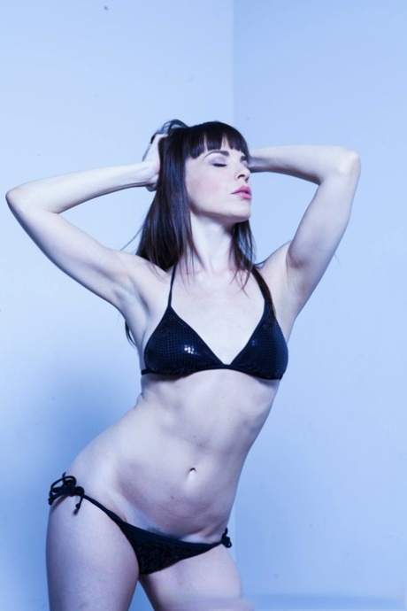 Super sexy MILF Dana Dearmond teasing erotically in latex bikini & high heels - PornHugo.net