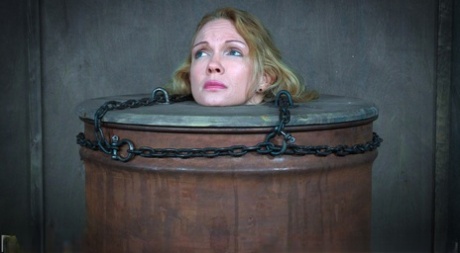 Blonde woman Rain Degrey is subjected to complete humiliation while being held captive in a hidden dungeon.