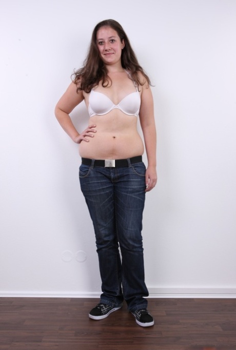 Plump Girl Klara Stands Fully Clothed Before Making Her Totally Nude Debut