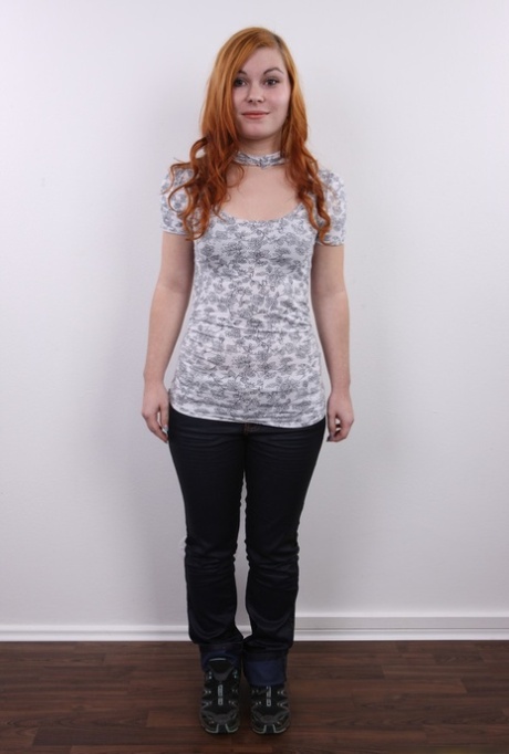 Showing off: Chubby redhead Hanna displays her plump buttocks and A-cup thighs for the first time.