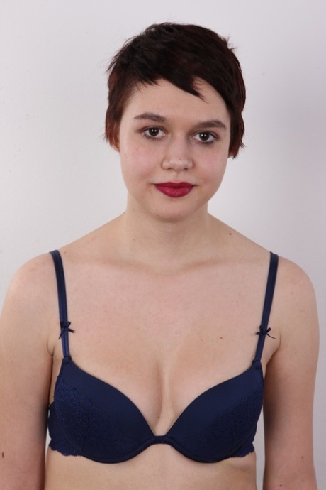 For the first time, a slim female with short hair and red lips goes naked.