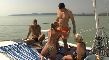 Blonde Chicks In Ponytails And Sunglasses Have Group Sex On A Yacht