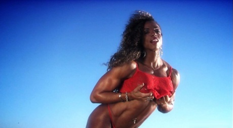 Ebony Bodybuilder Alexis Ellis Reveals Her Under Boobs At Low Tide On A Beach