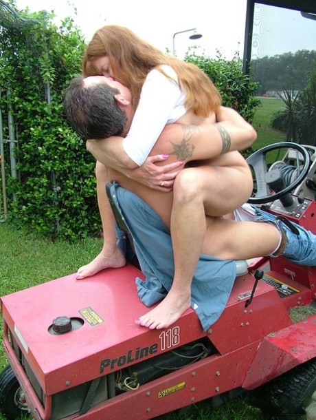 While her older amateur partner is cutting the grass, Dee Delmar jumps on to her guys' dick.