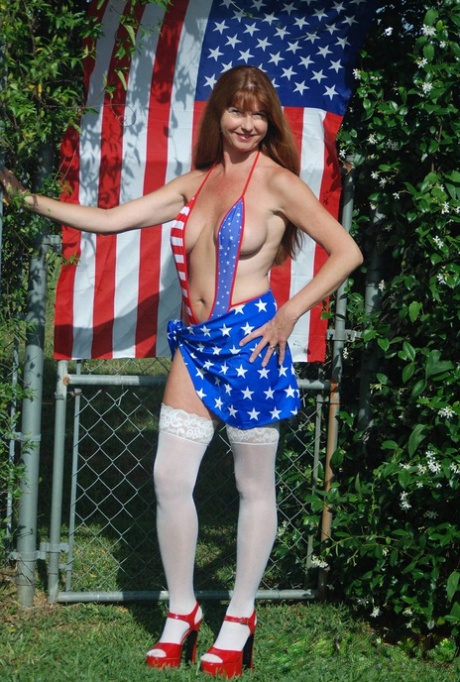 Hot Mature Dee Delmar In Patriotic Swimsuit Flaunting Firm Big Tits In The Sun