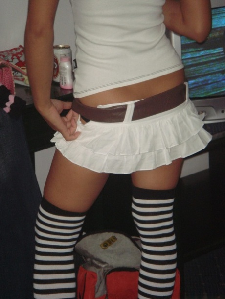 A Thai 18-year-old girl wears socks covering her over the knees after a couple of beers.