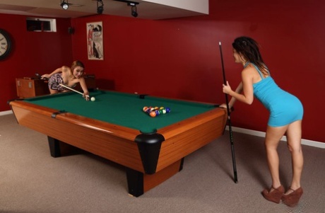Teen lesbians Daisy Haze and Marina Nagel appease horny twats on a pool table
