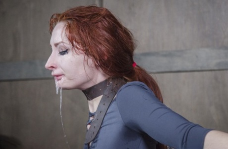 A rough throat fuck is unleashed on pale redhead Violet Monroe as she engages in dungeon crawling.