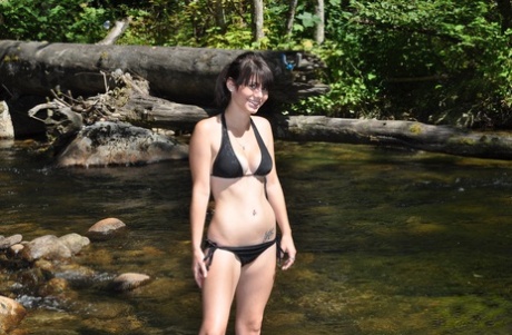 Brunette Amateur Hailey Removes Her Bikini To Show Wet Nice Tits In The River