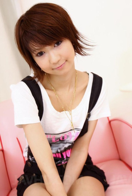 Japanese redhead Miriya Hazuki is masturbated before posing while dressed
