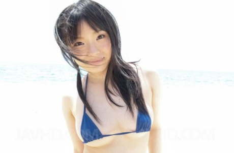 Japanese Girl Hina Maeda Gives Her Man Friend A BJ And Handjob At The Beach