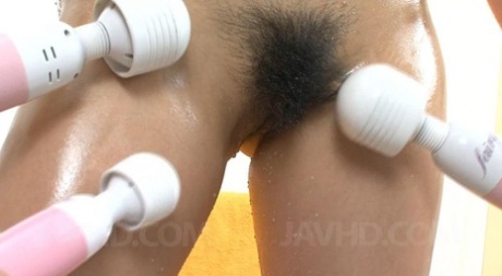 The hairy twat of Hinano Asian is often played with vibrators and canned beverages.