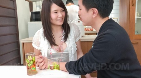 Young Looking Japanese Girl Sanae Akino Gives A Blowjob Behind Her Guy's Back