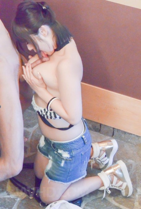 During the game, Wakaba Onoue Asian squeezes himself between two of his generous knockers.