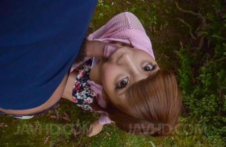 Redheaded Japanese Girl Anna Anjo Gives A Fully Clothed Blowjob In A Yard