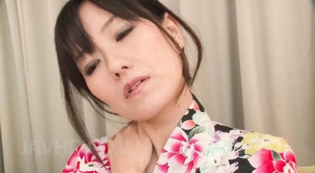 Japanese MILF Manami Komukai Is Relieved Of Her Kimono Before MMF Sex