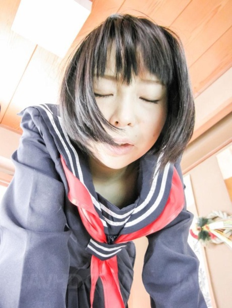 Japanese student Yuri Sakurai performs oral and vaginal sex while wearing her uniform.