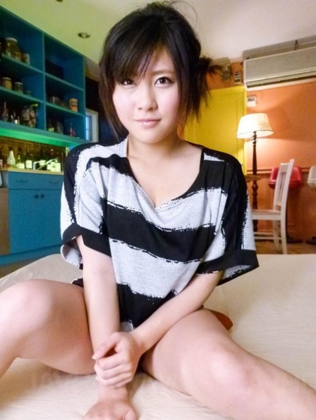 Japanese girl, Kyouka Mizusawa has a sexual encounter with two boys simultaneously on a mattress.