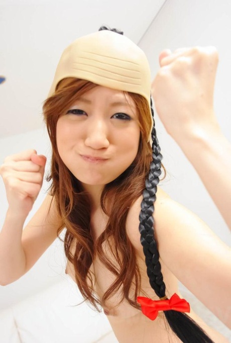 Diverse head coverings are worn by Shirosaki Karin during sexual activity.