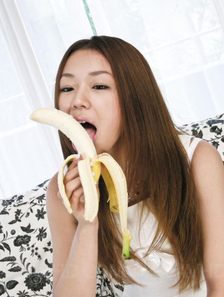 Japanese Hottie Sakura Hirota Peels A Banana Before Sucking Toys And Cock