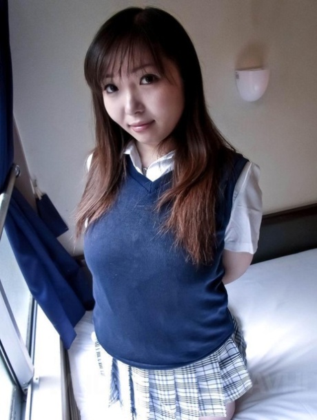 Shoned: Japanese schoolgirl Haruka Ohsawa shows her fully developed breasts.