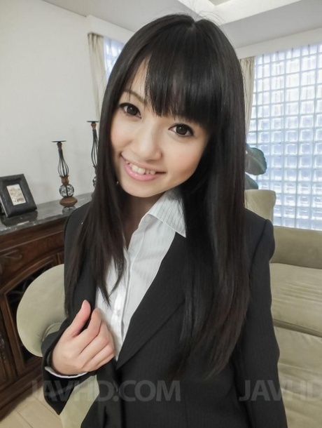 The cute Kotomi Asakura from Japan squirts while participating in gang banning.