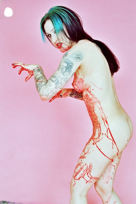 Red Spattered Pale Vampire Beauty With Great Tattoos