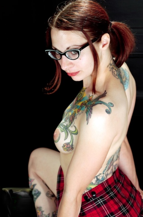 Heavily Tattooed Redhead Strips Off Schoolgirl Attire In Black Hooker Socks