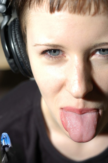 Slender Girl With Short Hair Misty Spins Vinyl In The Nude With Headphones On