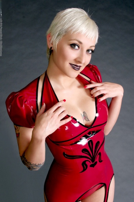 Short Haired Blonde Nikki Vega Releases Her Big Tits From Latex Attire