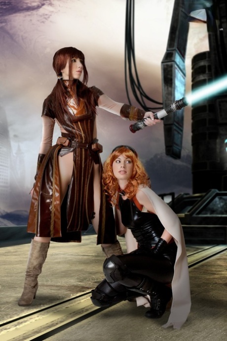 Lesbian Cosplayers Fondle Each Other While Removing Their Outfits