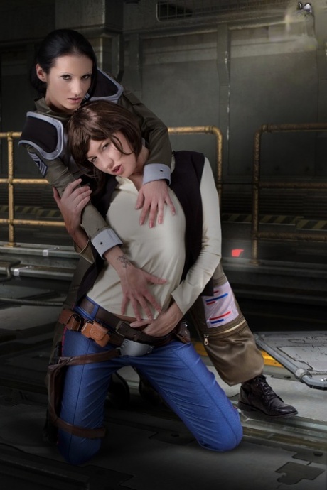 Cosplay Enthusiasts Partially Disrobe For A Bout Of Lesbian Sex