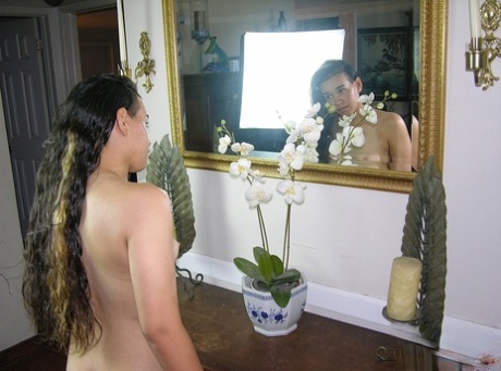 Sam, a Puerto Rican female perform her initial nude poses by spreading out the tight cut with her fingers.