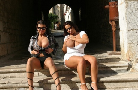 Lesbian women Aneta Buena and Kora Kryk wear big tits in public to enjoy their private time.