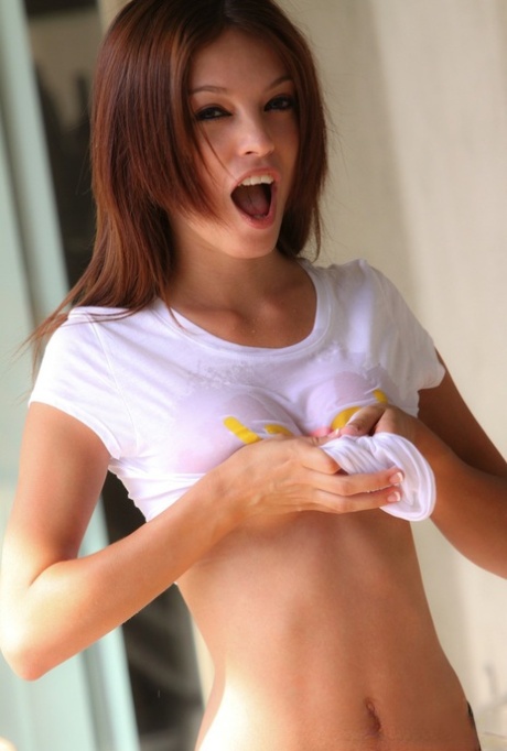 Brunette First Timer Lifts Up Her T-shirt And Takes Off Her Jean Shorts