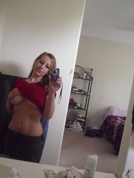 Busty Amateur Lizzy Takes Self Shots Of Her Boobs And Booty In A Mirror