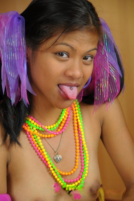 Splendid Filipina go-go girls squirm while getting nude.
