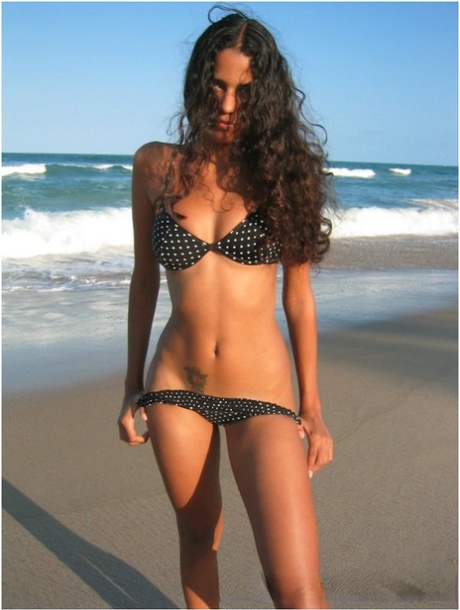 Brazilian Amateur Polliana Models A Bikini On A Sandy Beach