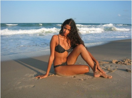 Brazilian Amateur Polliana Models A Bikini On A Sandy Beach