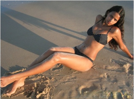 Brazilian Amateur Polliana Models A Bikini On A Sandy Beach