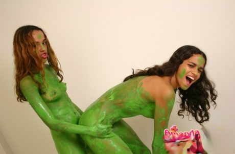 Latina lesbians paint their naked bodies a shade of green #3