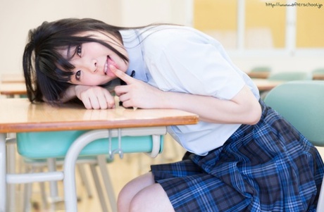 Horny Asian Schoolgirl Lifts Up Her Skirt And Masturbates