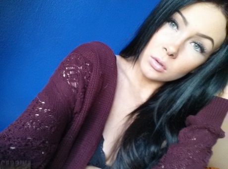 With long black hair and a hobby in her life, Sabrina Sins takes nude selfies.