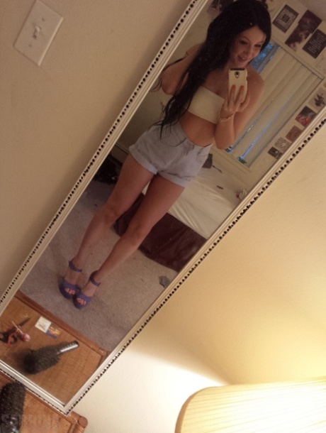 Teen Amateur Sabrina Sins Sports Long Hair While Taking Revealing Selfies