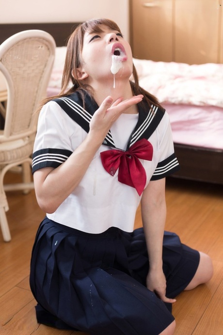 Japanese Schoolgirl Spits Out Cum After Sucking Off Two Cocks