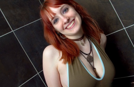 Hot Redhead Ellette Stripping Off Her Swimsuit To Get Naked In The Shower