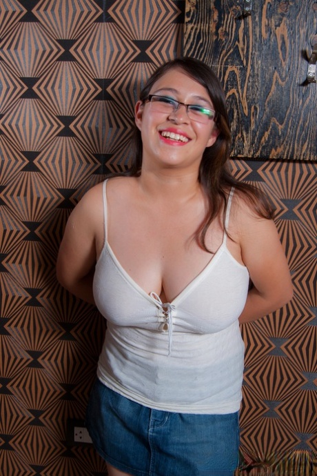 Before unleashing their massive natural tits, Chubby amateur takes off her glasses.